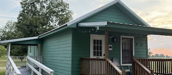 Cottage tucked in back of orchard with full kitchen and lake access!