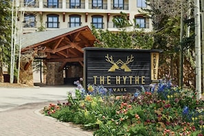 A hotel entrance with a sign reading 'The Hythe' and 'Vail.' - Luxury 1 Bedroom at The Hythe in Lionshead Village (Vail)
