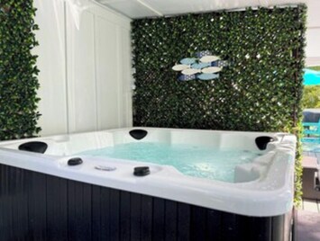 Enjoy the hot tub with views of the lake!