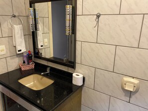 Basic Double Room, Courtyard View | Bathroom | Hair dryer, towels