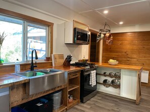 HOMESTEAD HOUSE, 4 bedrooms, Kitchen, Partial Ocean View | Private kitchen | Microwave, toaster, cookware/dishes/utensils, cleaning supplies