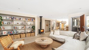 TV, fireplace, books, offices