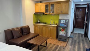 Deluxe Apartment, Kitchenette, City View | Private kitchen | Mini-fridge, electric kettle, cleaning supplies, paper towels - Era Apartment Ha Yen Quyet (Hanoi)