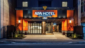 The APA Hotel entrance with a modern facade, illuminated signage, and a clear view of the entrance doors. - APA Hotel Tokyo Nishikasai Ekimae (Tokyo)