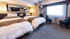 A hotel room with two beds, a small table, two chairs, a TV, and a large window with curtains. - APA Hotel Tokyo Nishikasai Ekimae (Tokyo)