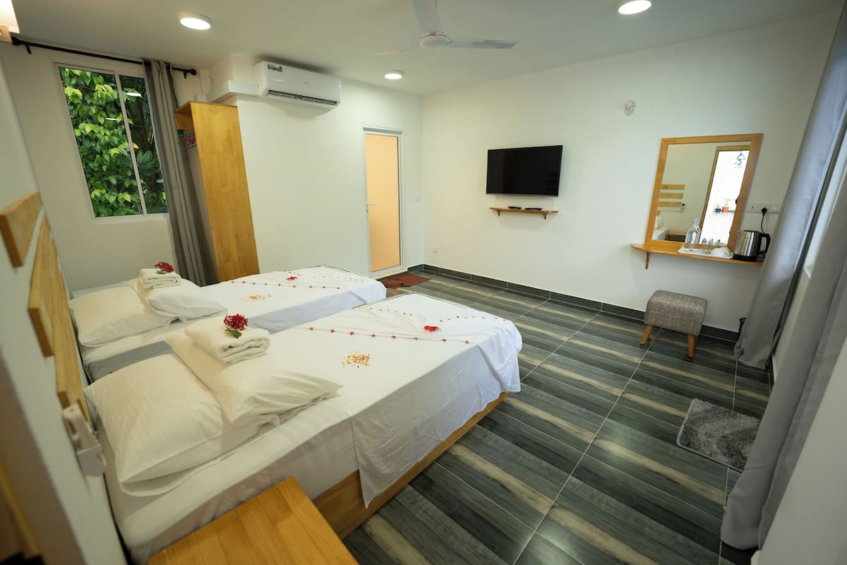 Chambre Deluxe avec lits jumeaux