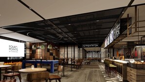A modern restaurant interior with wooden flooring, bar area, and seating arrangements. - Four Points by Sheraton Changzhou Economic Development Zone (Changzhou)