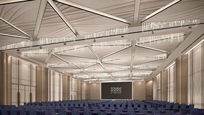 A large conference room with rows of tables and chairs, a large screen displaying "FOUR POINTS BY SHERATON", and a high ceiling with intricate lighting fixtures. - Four Points by Sheraton Changzhou Economic Development Zone (Changzhou)