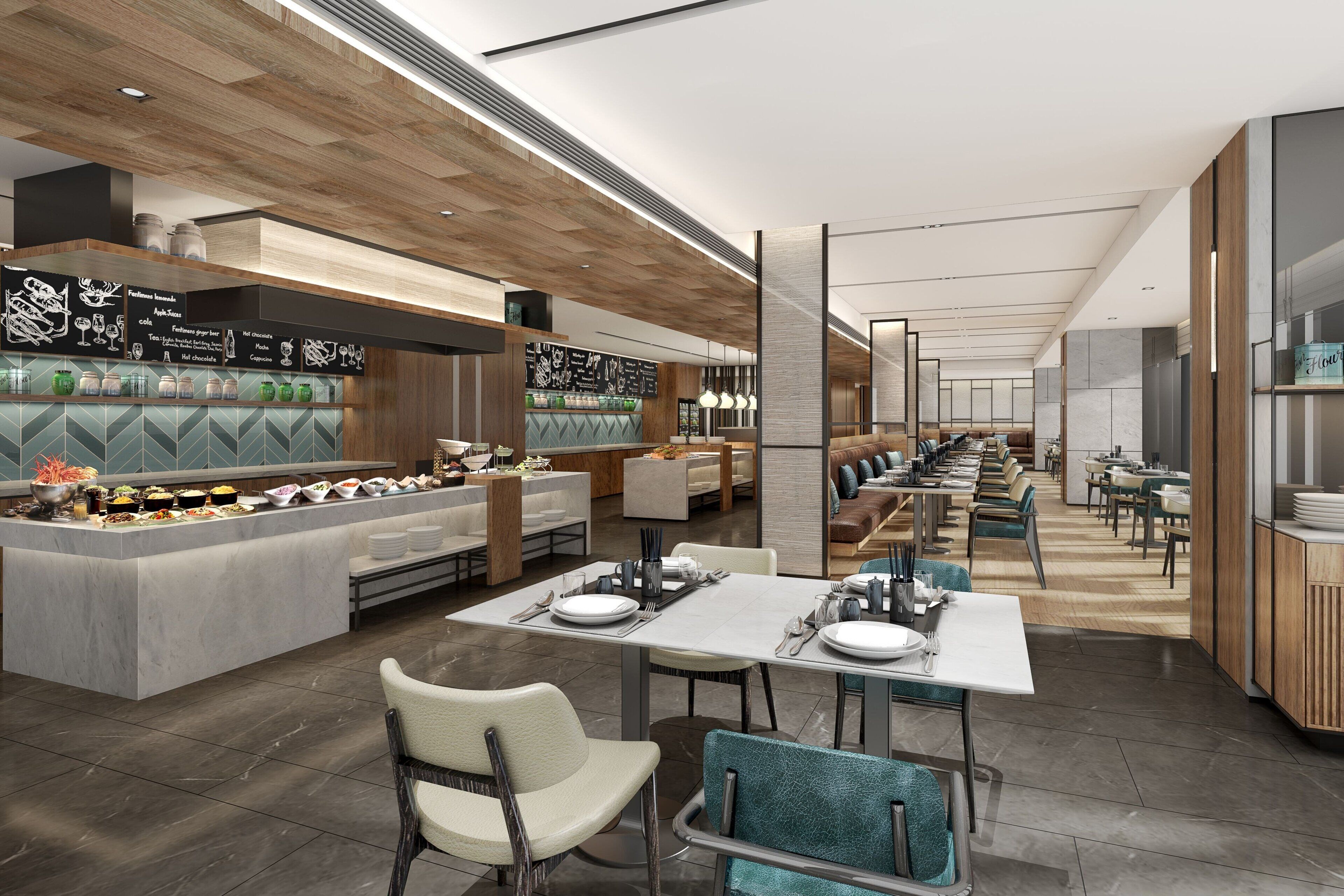 En moderne restaurant med en central ø, flere spiseborde og forskellige siddepladser.