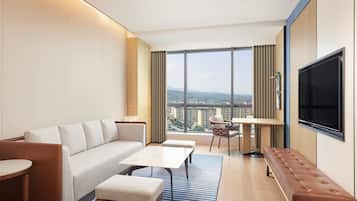 Standard Suite, 1 King Bed | Living room | 55-inch LCD TV with cable channels