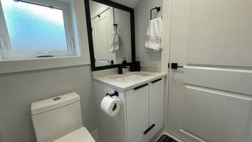 Shower, towels, toilet paper