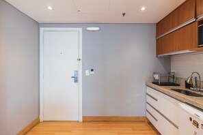 Chambre quadruple Deluxe | Cuisine privée