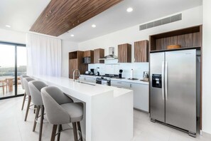 Fridge, microwave, oven, stovetop - Vista Del Arco | Cabo Luxury Penthouse Condo (Cabo San Lucas)