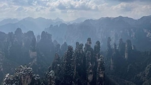 A mountainous landscape with tall, narrow rock formations. - Tianzishan Inn (Zhangjiajie)