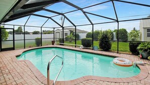 A covered swimming pool with a clear view of the surrounding area. - Modern 2 bedroom home with private pool & garage - Avalon (Englewood)