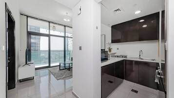 Leilighet – comfort, byutsikt | Eget kjøkken | Kjøleskap, mikrobølgeovn, ovn og kokeplater