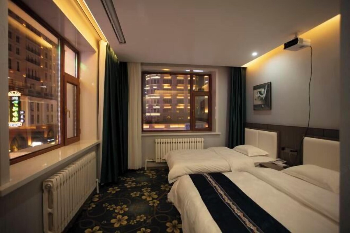 Desk, blackout drapes, bed sheets