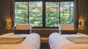2 多间卧室、羽绒被、加厚床垫、客房内保险箱