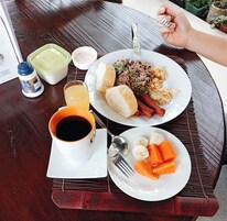 Daily cooked-to-order breakfast (USD 9 per person)