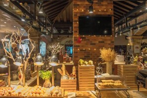 A bakery display with various baked goods and decorative elements.