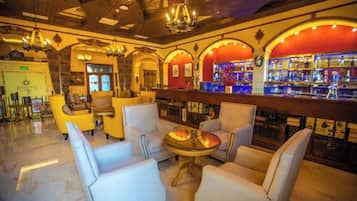 A bar area with seating and a bar counter.