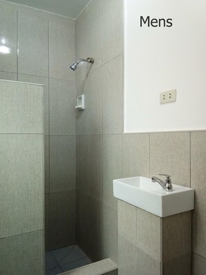 Shower, towels, soap, shampoo - Room 104 at Liezels B & B, is a Dorm room for up to 8 friends or family members. (Palompon)