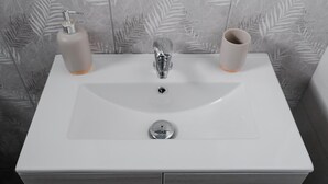 A bathroom sink with a faucet, a soap dispenser, and a cup. - Orsiida Classic Double Room Volos (Volos)