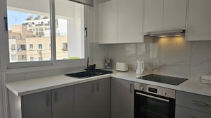 Fridge, microwave, oven, electric kettle