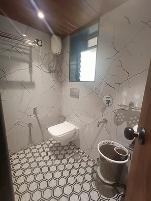 Habitación triple Deluxe | Baño
