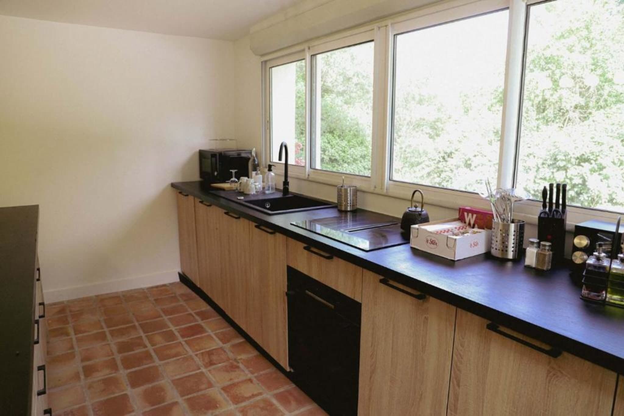 Fridge, cookware/dishes/utensils, spices, dining table