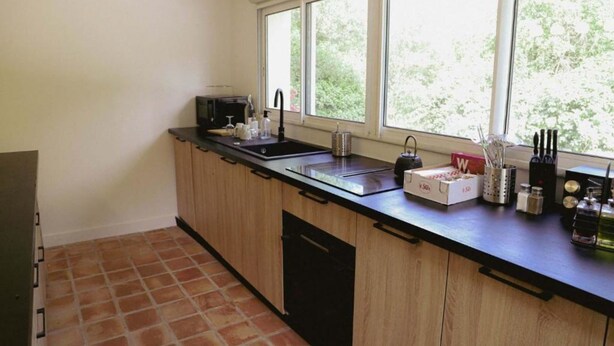 Fridge, cookware/dishes/utensils, spices, dining table