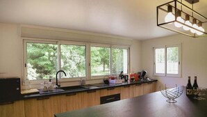 Fridge, cookware/dishes/utensils, spices, dining table