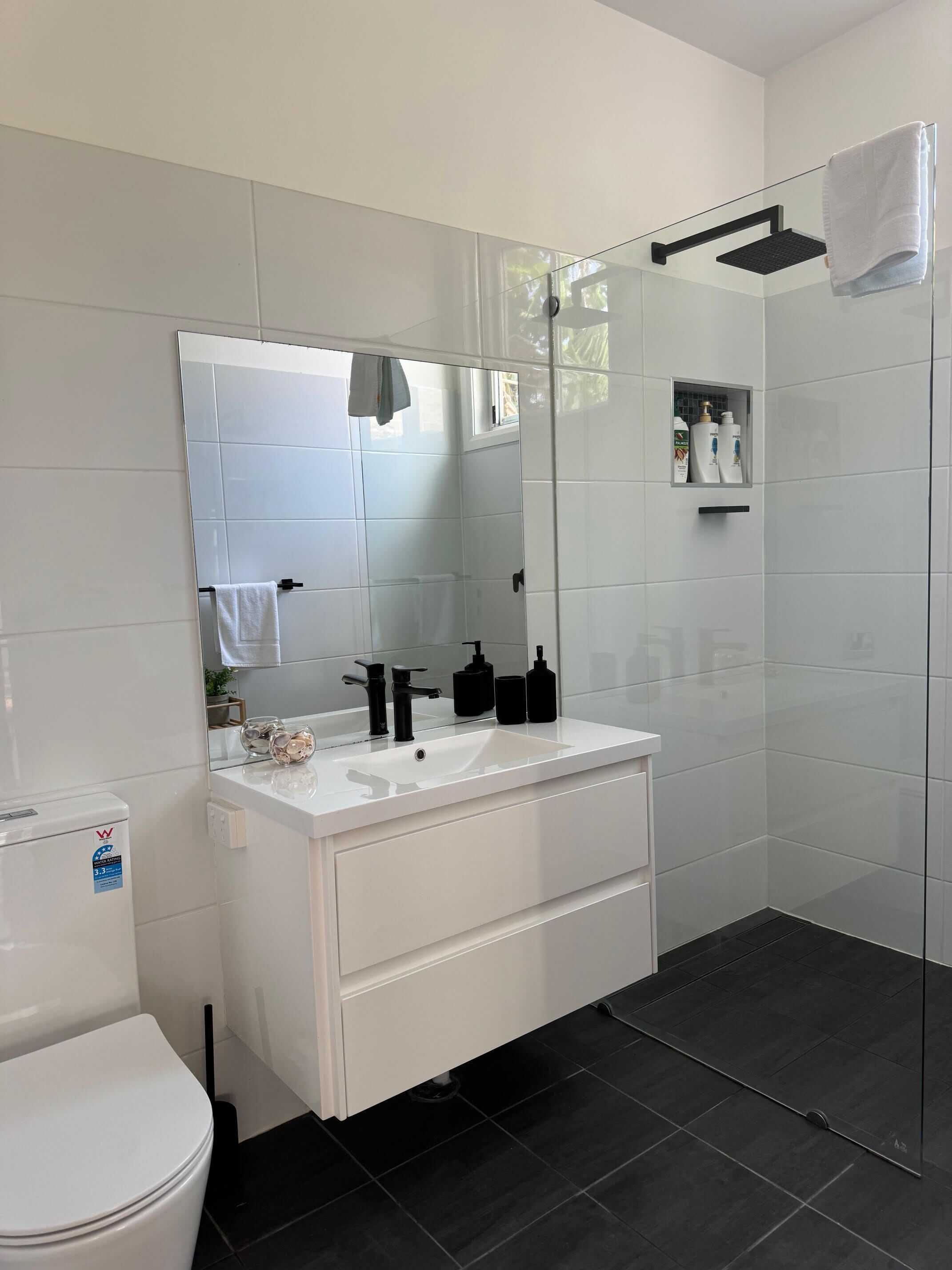 Shower, hair dryer, towels, soap