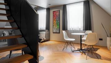 Exclusive Apartment | Living area | 27-inch Smart TV with digital channels