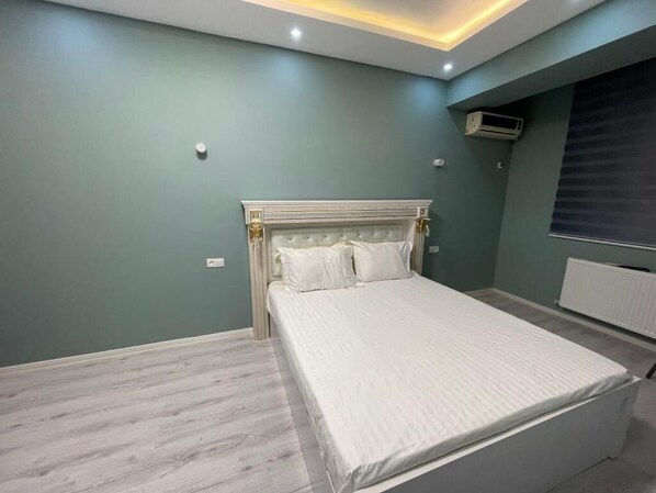 1 habitación, tabla de planchar con plancha y wifi 