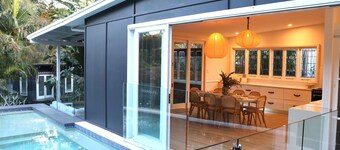 Beach bungalow with a pool.