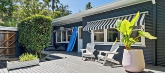 Beach bungalow with a pool.