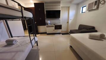 Habitació familiar | Wifi gratuïta i roba de llit