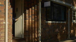 A brick building with a sign reading 'MARLOWE' above a window. - 2BR with Parking | Walk to QPAC & South Bank (South Brisbane)
