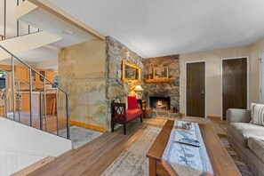 Smart TV, fireplace, DVD player, books