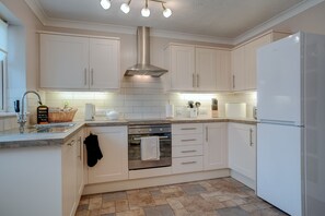 Réfrigérateur, micro-ondes, four, lave-vaisselle