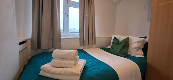 Apartamento | 3 dormitorios, tabla de planchar con plancha, wifi gratis y ropa de cama