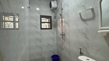 Shower, bidet, towels, soap