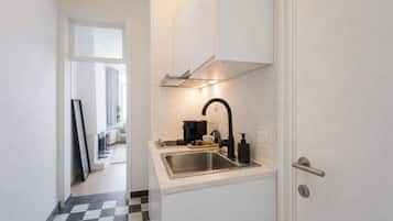 Apartamento | Cozinha americana privada | Geladeira grande, fogão, cooktop, lava-louças