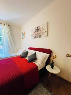 2 habitaciones, tabla de planchar con plancha, wifi y ropa de cama 