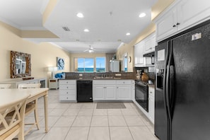 Fridge, microwave, oven, stovetop - Gulf-front condo w/ pool & balcony views (Panama City Beach)