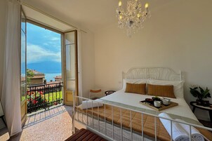 Family Apartment, Multiple Bedrooms, Beachside (Giardino Floreale di Menaggio) | 4 bedrooms, iron/ironing board, free WiFi, bed sheets