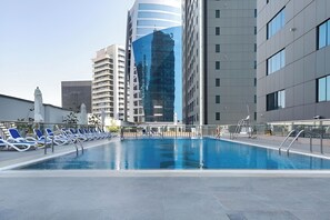 Outdoor pool - Waves - Executive Bay Studio: Canal View/Modern Amenities (Dubai)