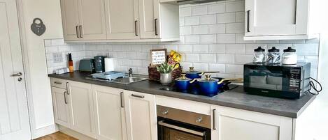 Apartment | Private kitchen | Fridge, microwave, oven, stovetop