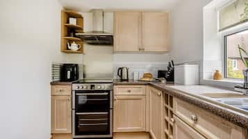 Fridge, microwave, oven, cookware/dishes/utensils